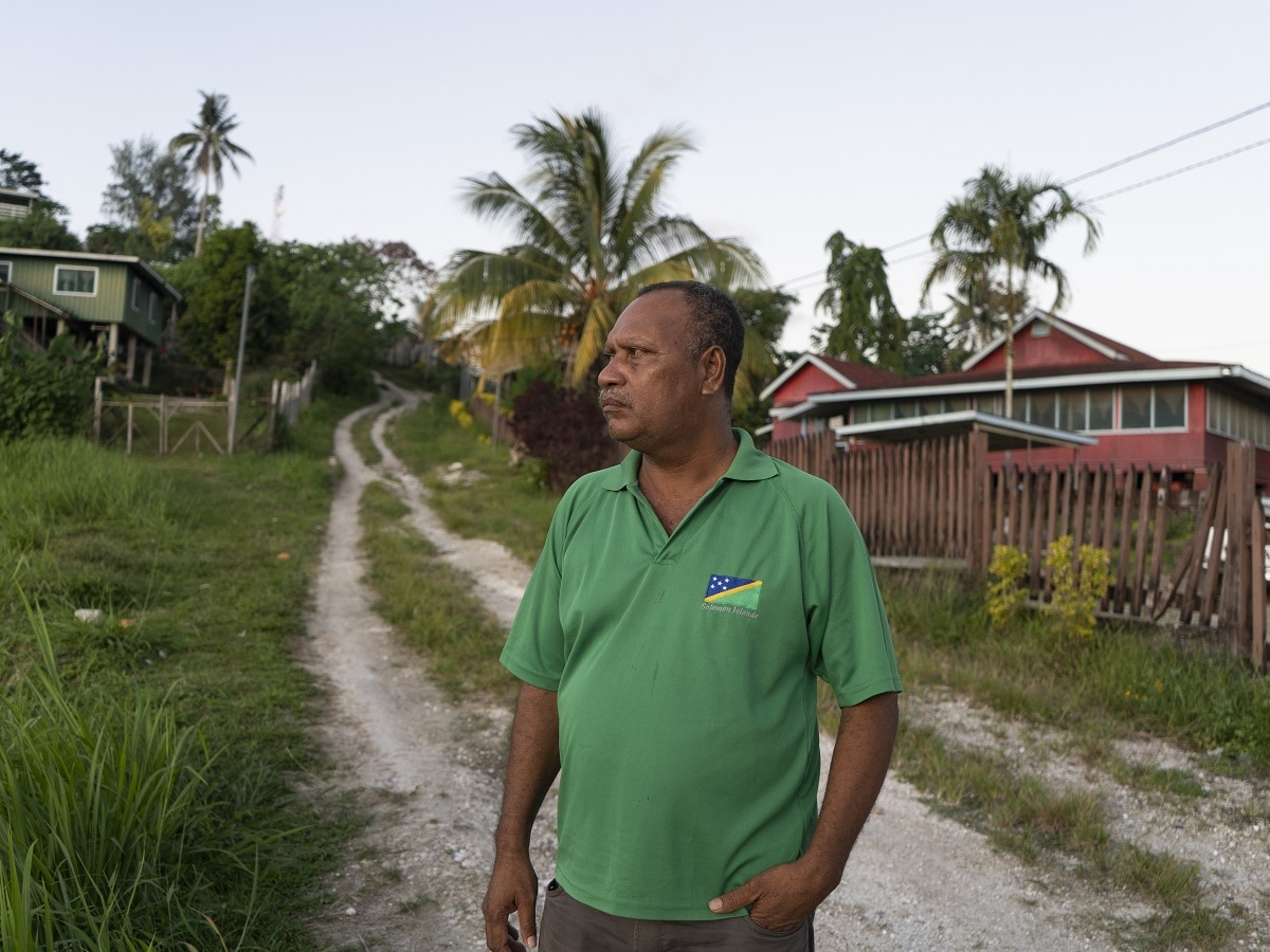 Daniel Suidani, the provincial premier of Malaita, stands outside his office in the town of Auki. Suidani refuses to recognize China, which has caused tensions with the federal government. He denies any connection to the protests that turned into riots last November, but admits he refused to help diffuse the situation. (Photo by Michael Miller/The Washington Post via Getty Images)